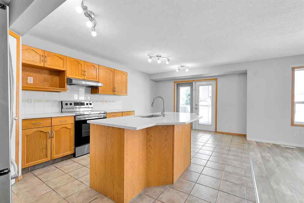 MLS® A2243647 - 35 Saddlehorn Crescent NE in Saddle Ridge Calgary, Residential
