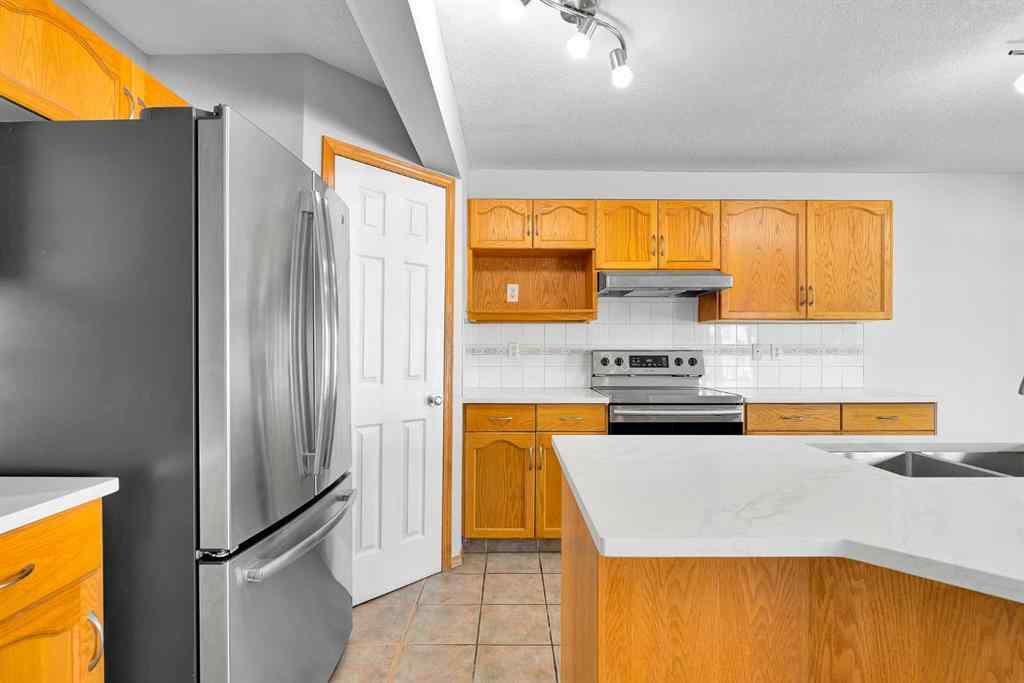 MLS® A2243647 - 35 Saddlehorn Crescent NE in Saddle Ridge Calgary, Residential