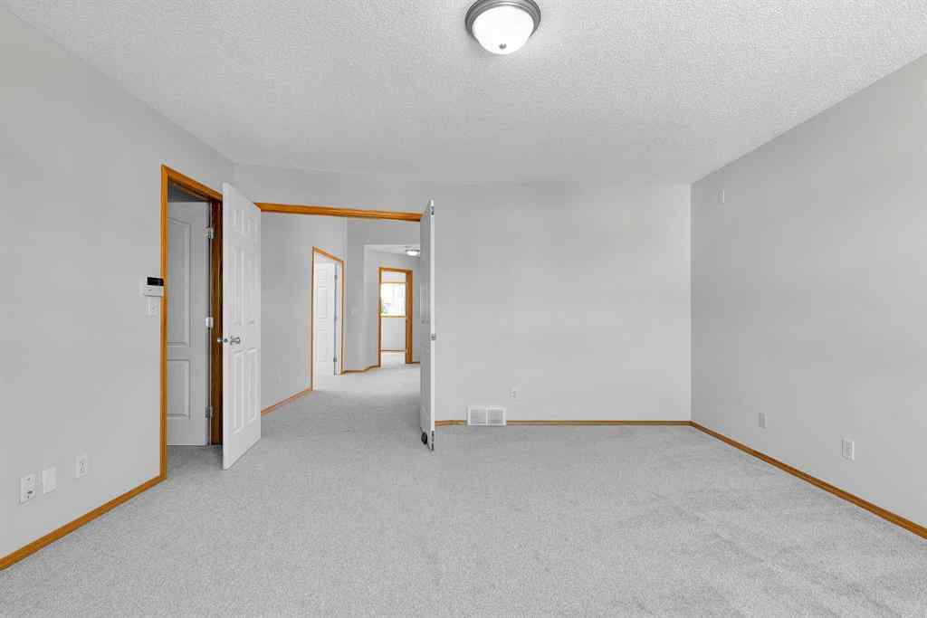 MLS® A2243647 - 35 Saddlehorn Crescent NE in Saddle Ridge Calgary, Residential