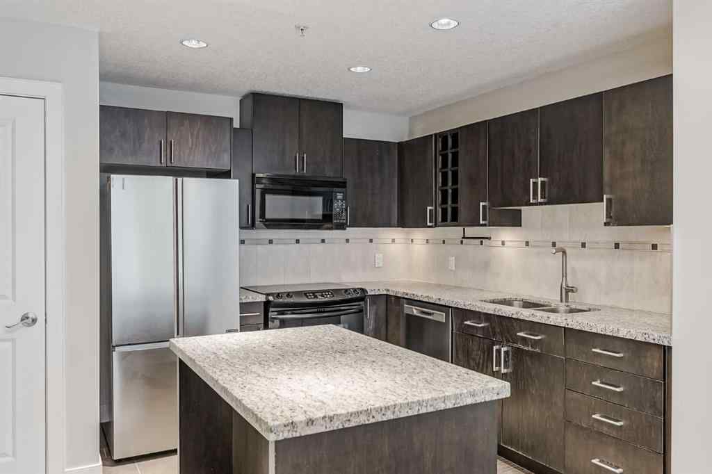 MLS® A2243699 - Unit #405 77 Spruce Place SW in Spruce Cliff Calgary, Residential