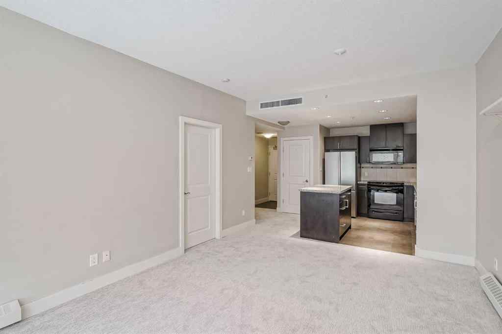 MLS® A2243699 - Unit #405 77 Spruce Place SW in Spruce Cliff Calgary, Residential