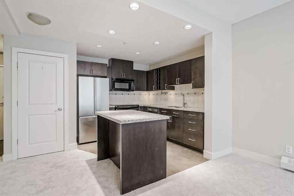 MLS® A2243699 - Unit #405 77 Spruce Place SW in Spruce Cliff Calgary, Residential