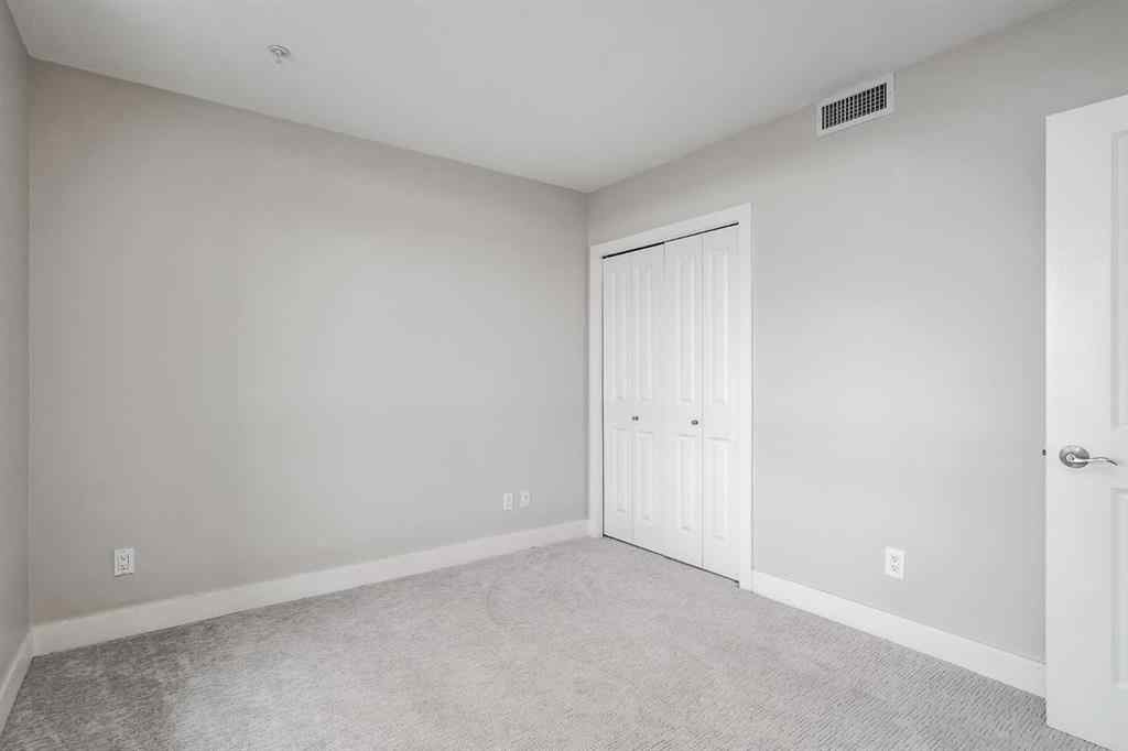 MLS® A2243699 - Unit #405 77 Spruce Place SW in Spruce Cliff Calgary, Residential