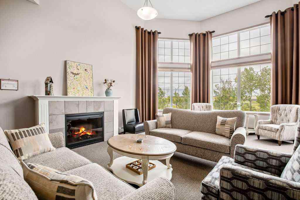 MLS® A2243737 - Unit #311 1 Crystal Green Lane  in Crystal Green Okotoks, Residential