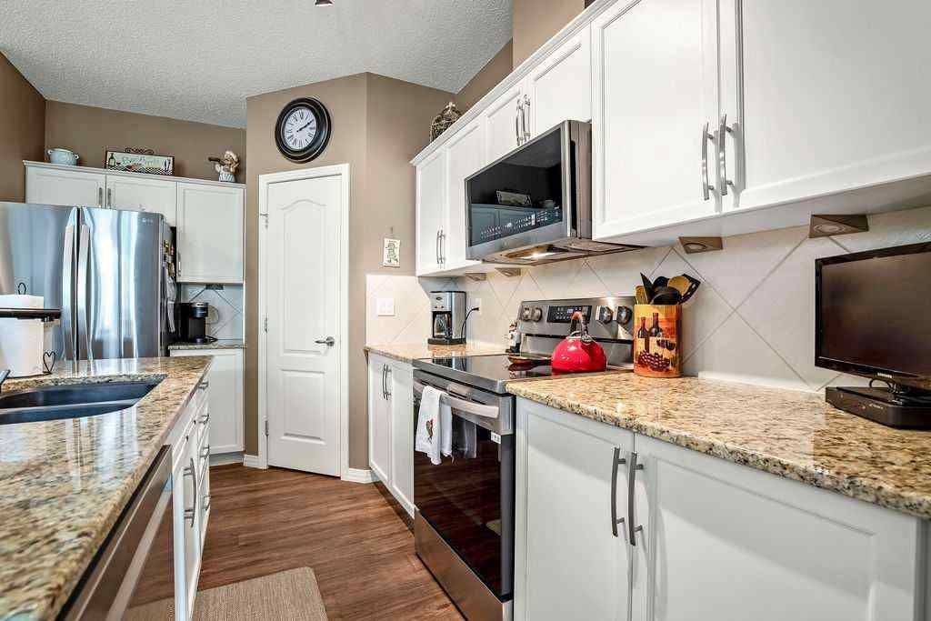 MLS® A2243737 - Unit #311 1 Crystal Green Lane  in Crystal Green Okotoks, Residential