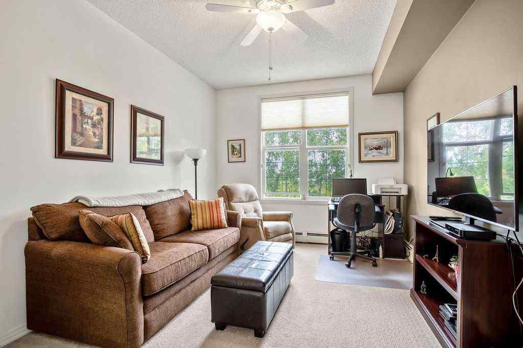 MLS® A2243737 - Unit #311 1 Crystal Green Lane  in Crystal Green Okotoks, Residential