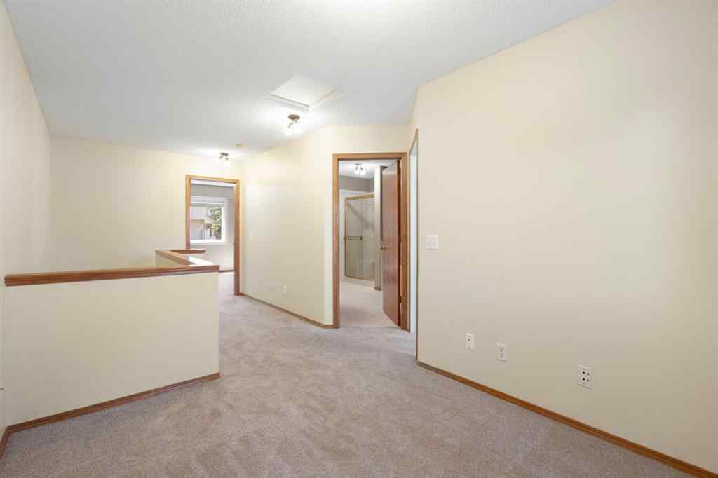 MLS® A2243895 - 243 Christie Park Mews SW in Christie Park Calgary, Residential