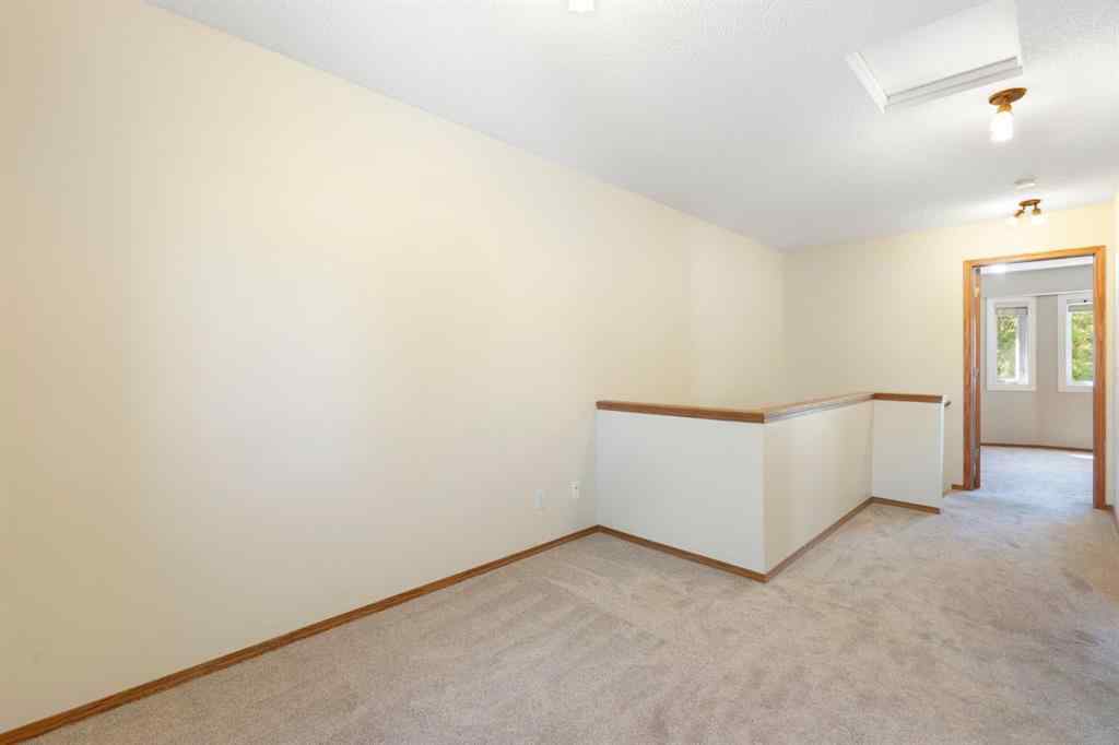 MLS® A2243895 - 243 Christie Park Mews SW in Christie Park Calgary, Residential