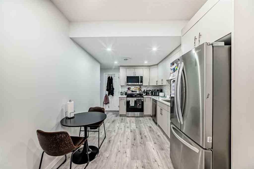 MLS® A2243901 - 116 Ambleton Street NW in Moraine Calgary, Residential
