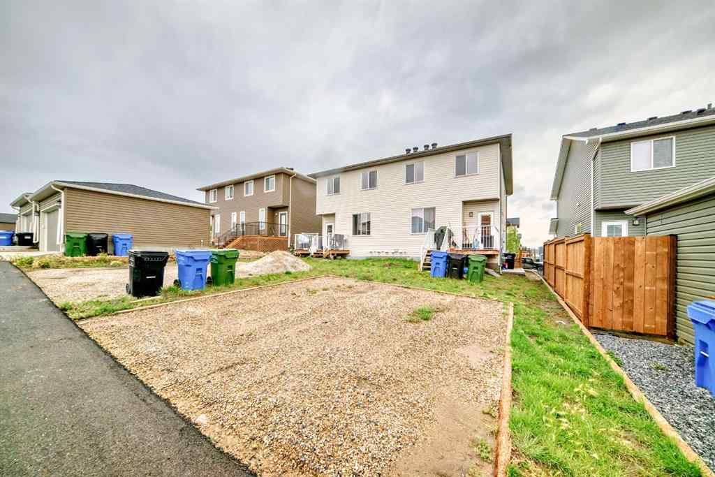 MLS® A2243901 - 116 Ambleton Street NW in Moraine Calgary, Residential