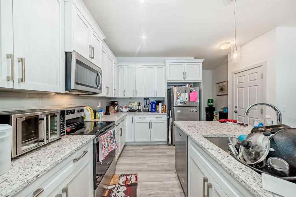 MLS® A2243901 - 116 Ambleton Street NW in Moraine Calgary, Residential