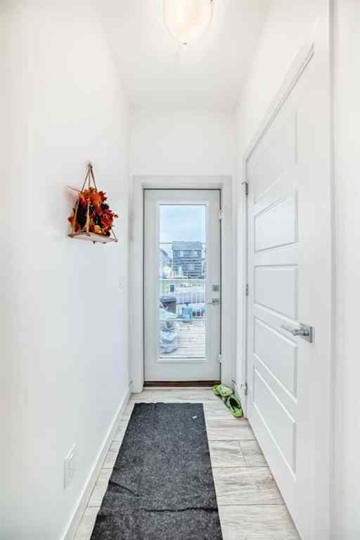 MLS® A2243901 - 116 Ambleton Street NW in Moraine Calgary, Residential
