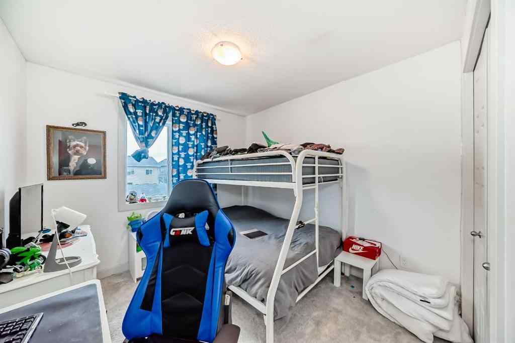 MLS® A2243901 - 116 Ambleton Street NW in Moraine Calgary, Residential