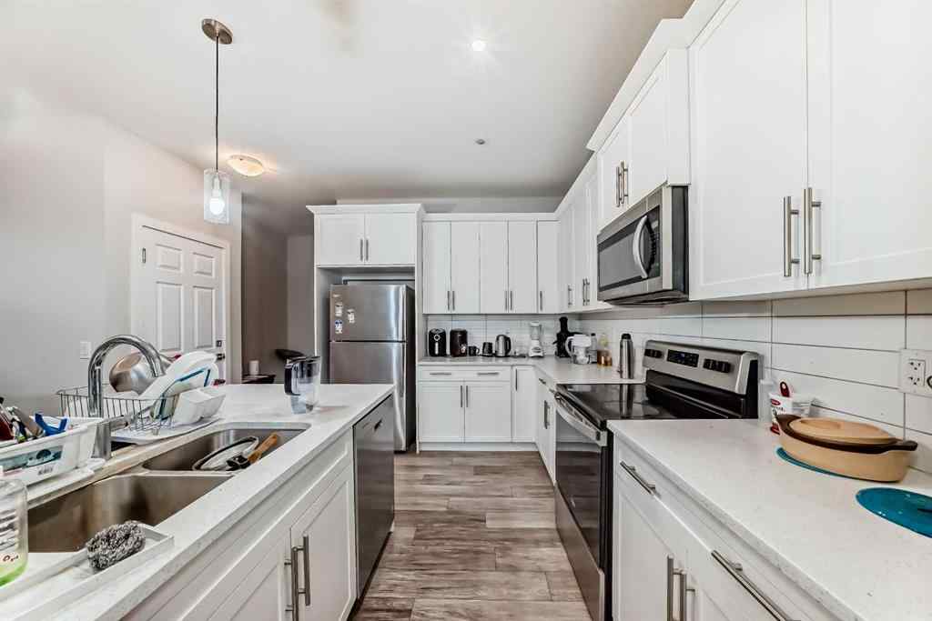 MLS® A2243927 - 112 Ambleton Street NW in Moraine Calgary, Residential