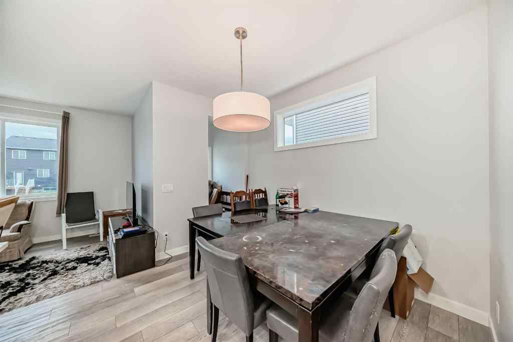 MLS® A2243927 - 112 Ambleton Street NW in Moraine Calgary, Residential