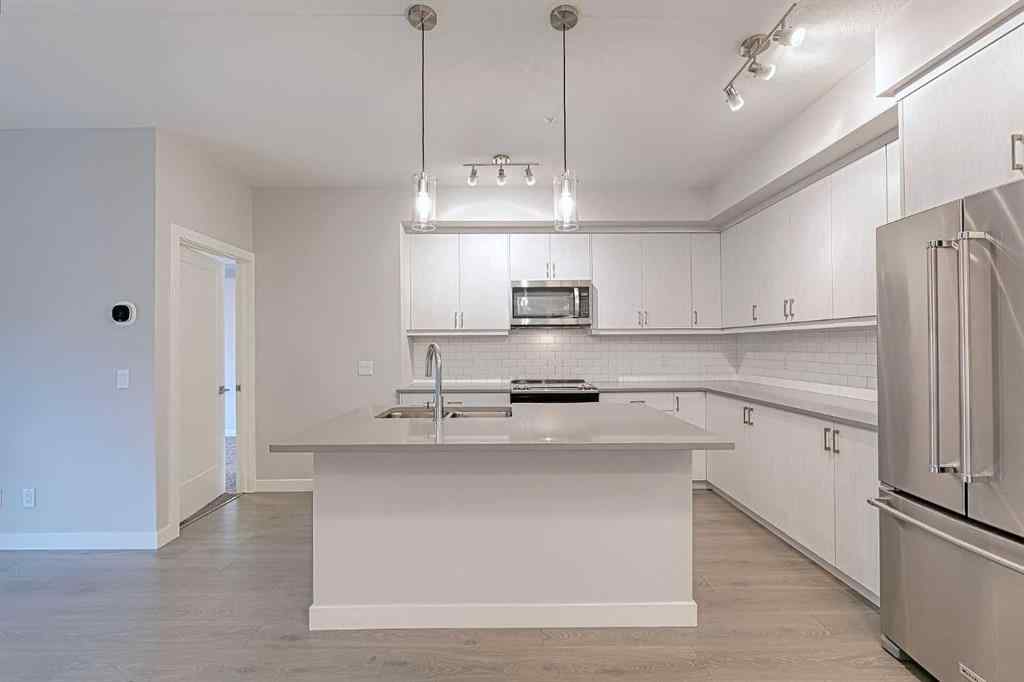 MLS® A2243938 - Unit #213 100 Auburn Meadows Manor SE in Auburn Bay Calgary, Residential
