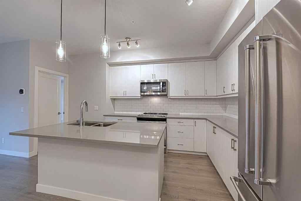 MLS® A2243938 - Unit #213 100 Auburn Meadows Manor SE in Auburn Bay Calgary, Residential