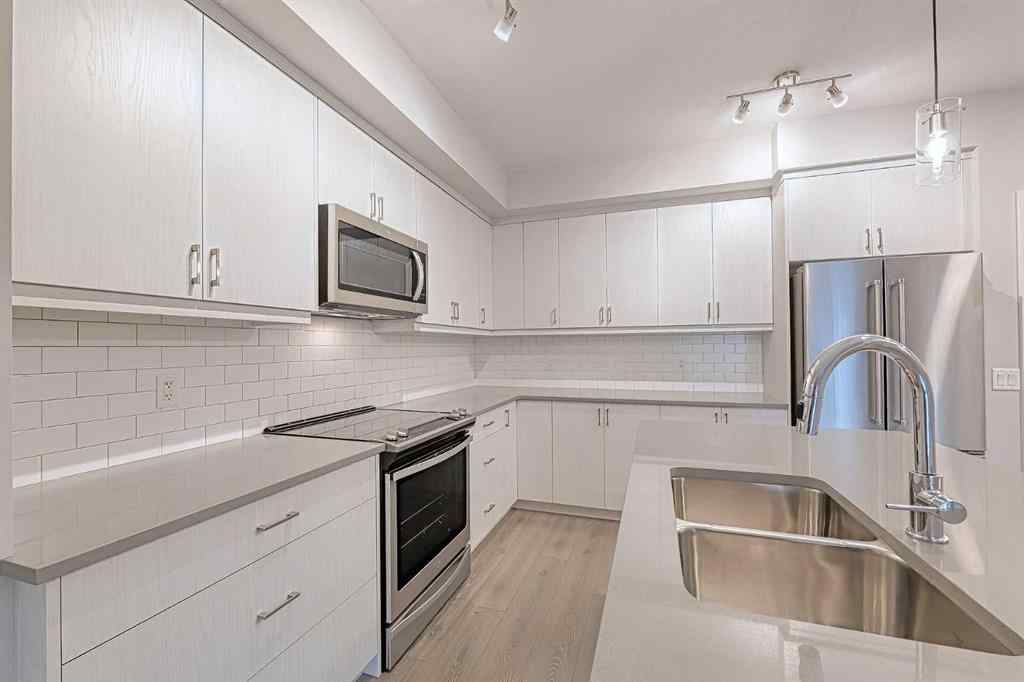 MLS® A2243938 - Unit #213 100 Auburn Meadows Manor SE in Auburn Bay Calgary, Residential