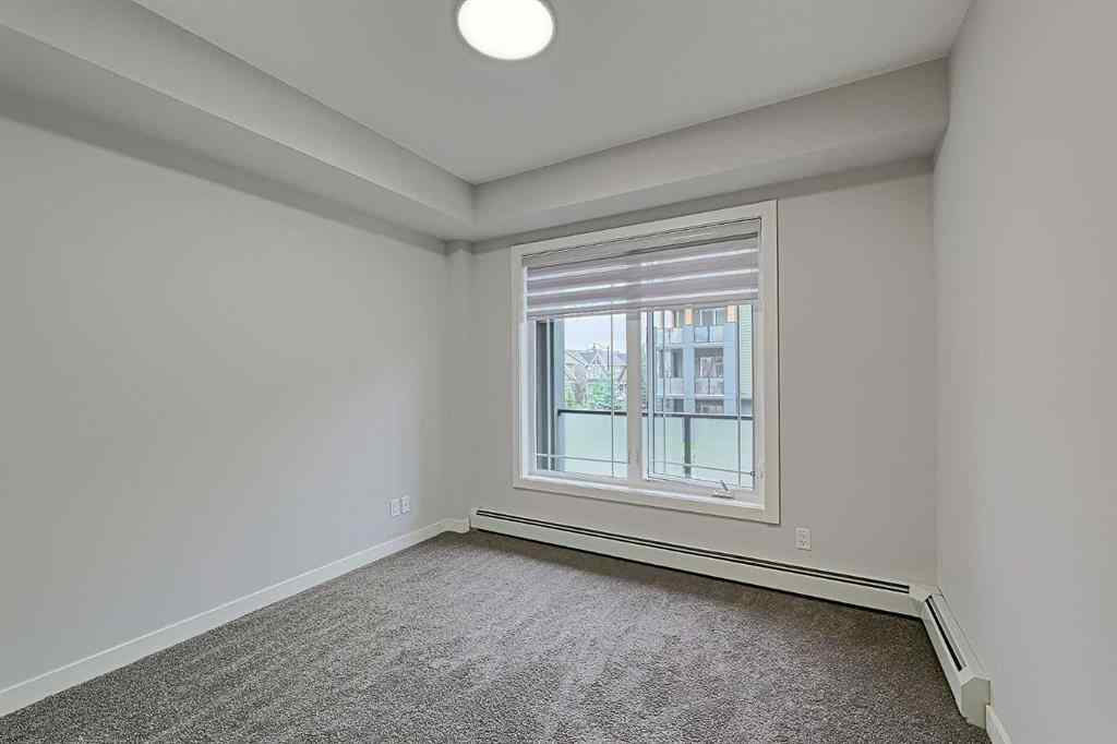 MLS® A2243938 - Unit #213 100 Auburn Meadows Manor SE in Auburn Bay Calgary, Residential