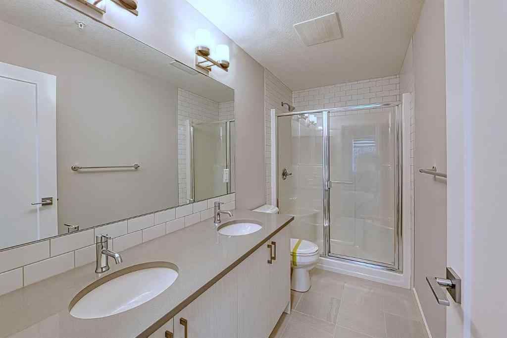 MLS® A2243938 - Unit #213 100 Auburn Meadows Manor SE in Auburn Bay Calgary, Residential