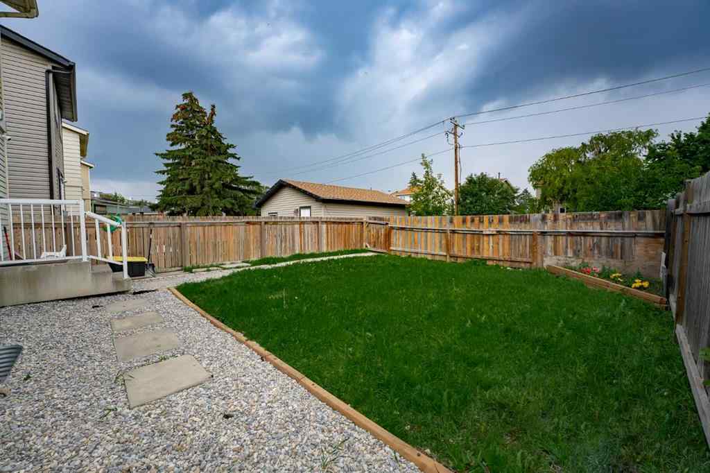 MLS® A2243971 - 25 Erin Ridge Road SE in Erin Woods Calgary, Residential