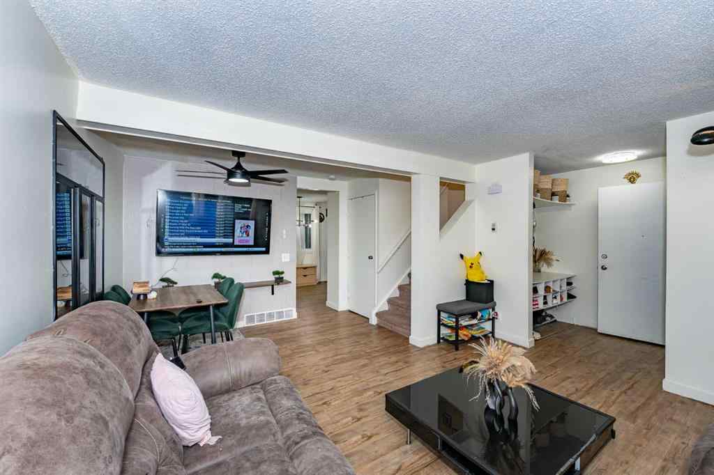 MLS® A2243971 - 25 Erin Ridge Road SE in Erin Woods Calgary, Residential