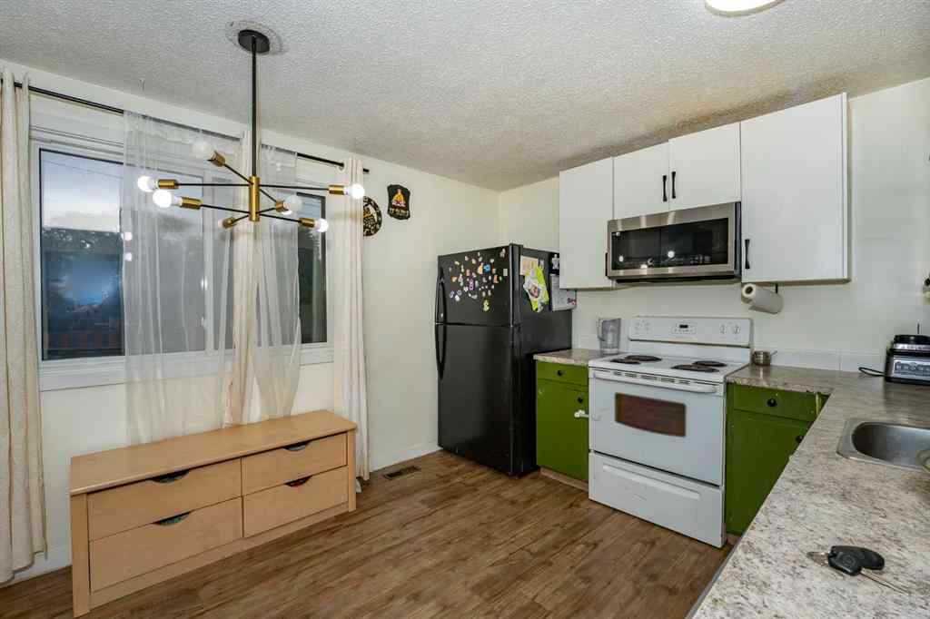 MLS® A2243971 - 25 Erin Ridge Road SE in Erin Woods Calgary, Residential