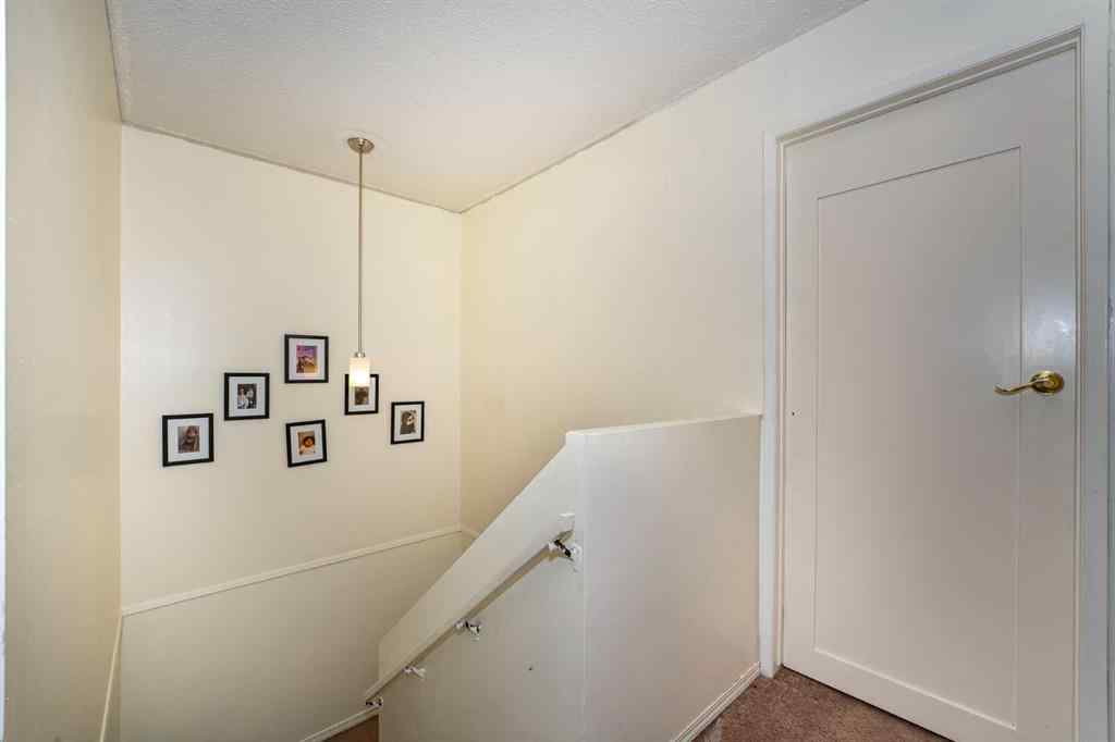 MLS® A2243971 - 25 Erin Ridge Road SE in Erin Woods Calgary, Residential