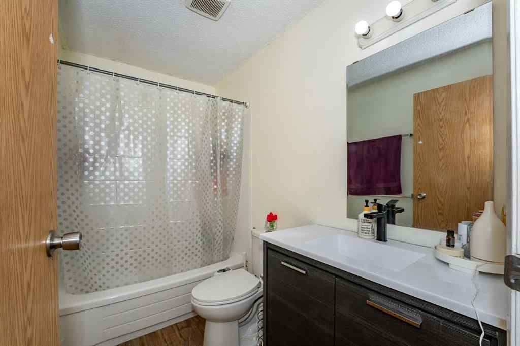 MLS® A2243971 - 25 Erin Ridge Road SE in Erin Woods Calgary, Residential