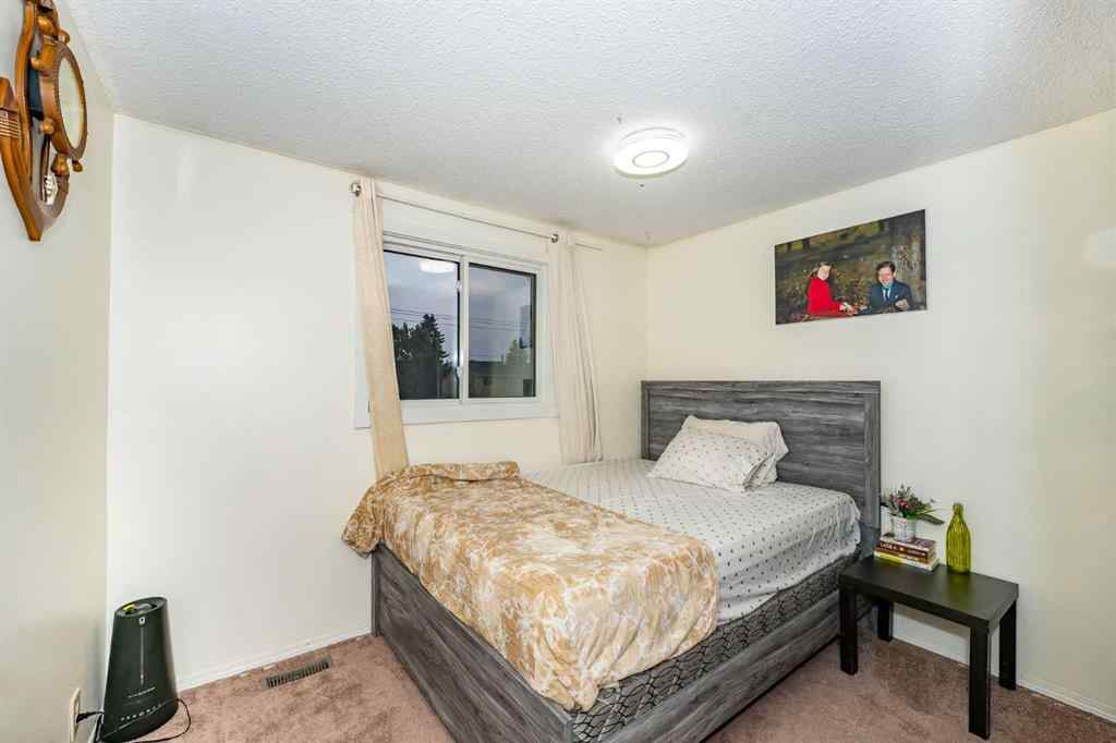 MLS® A2243971 - 25 Erin Ridge Road SE in Erin Woods Calgary, Residential