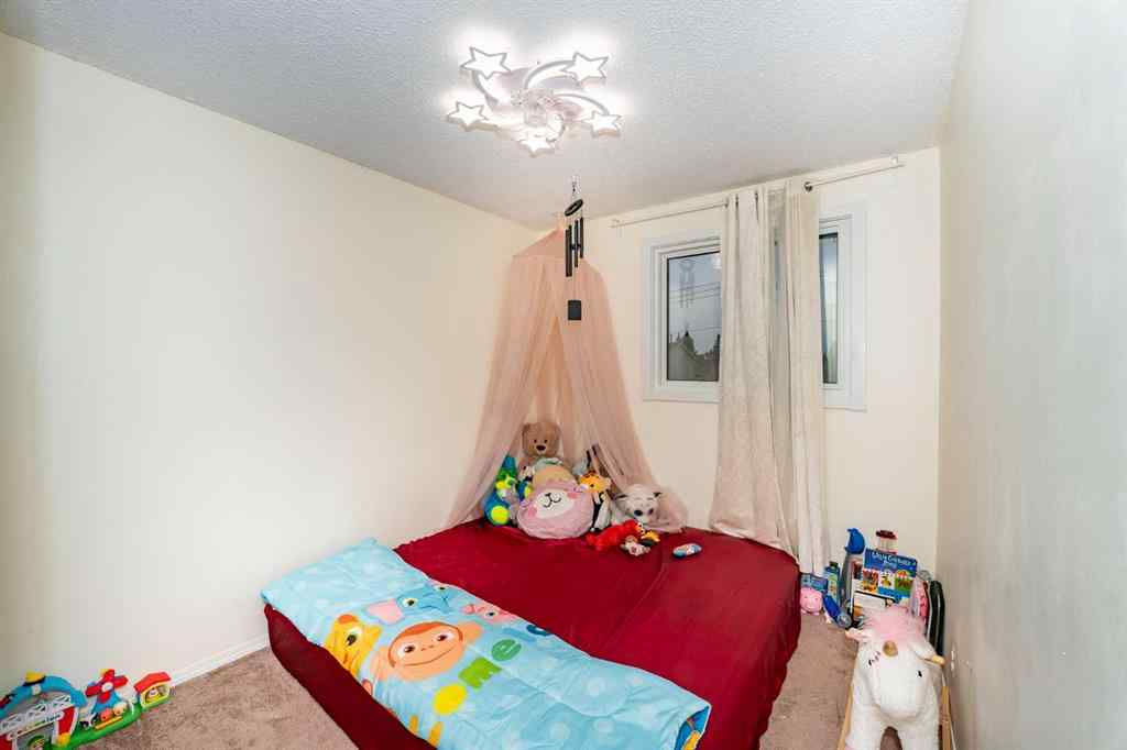 MLS® A2243971 - 25 Erin Ridge Road SE in Erin Woods Calgary, Residential