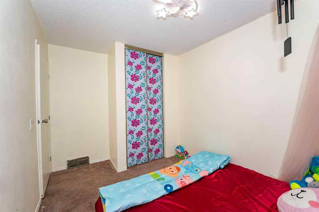 MLS® A2243971 - 25 Erin Ridge Road SE in Erin Woods Calgary, Residential