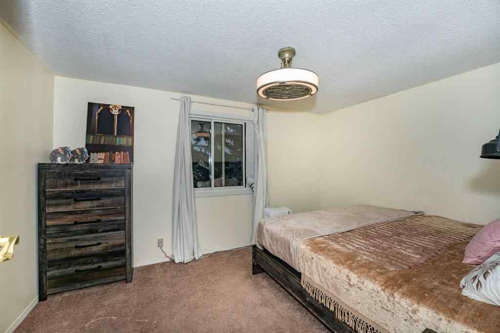 MLS® A2243971 - 25 Erin Ridge Road SE in Erin Woods Calgary, Residential