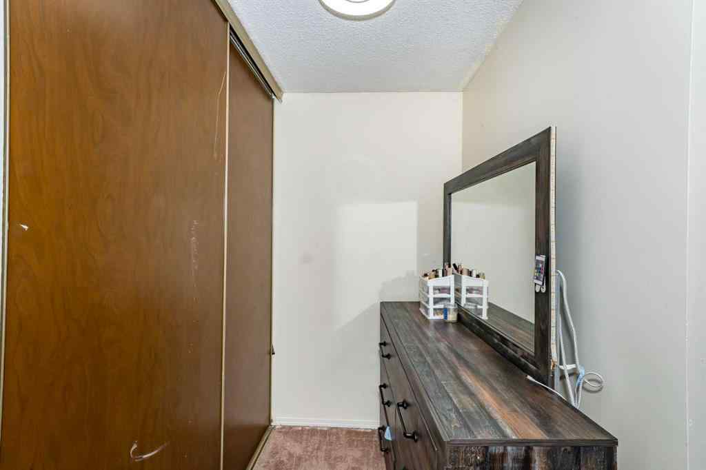 MLS® A2243971 - 25 Erin Ridge Road SE in Erin Woods Calgary, Residential