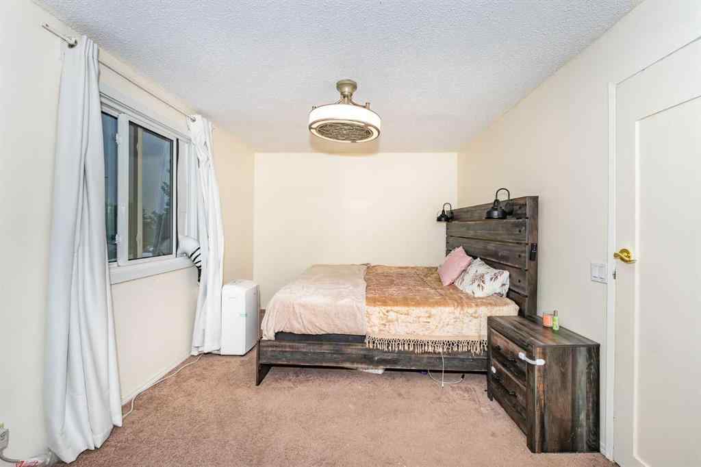 MLS® A2243971 - 25 Erin Ridge Road SE in Erin Woods Calgary, Residential