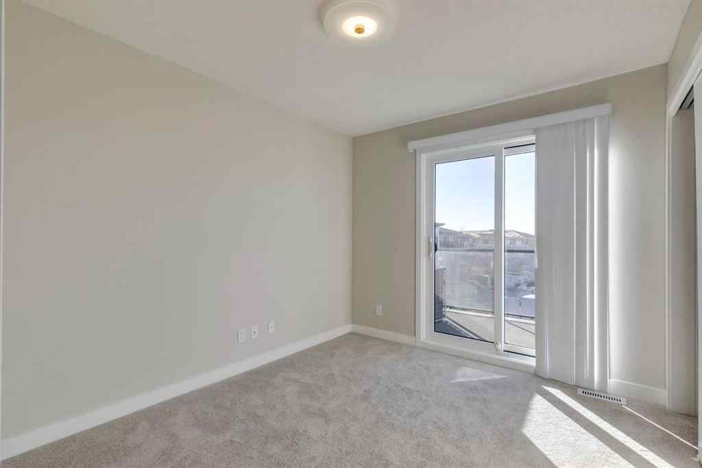 MLS® A2243984 - Unit #107 14800 1 Street NW in Livingston Calgary, Residential