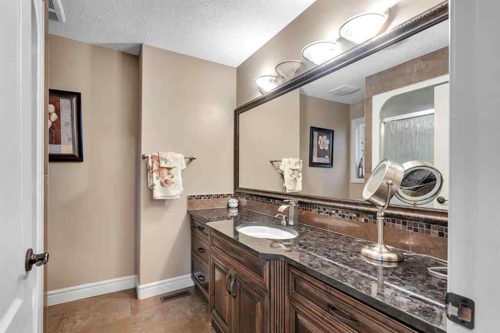MLS® A2243988 - 989 East Lakeview Road  in East Chestermere Chestermere, Residential
