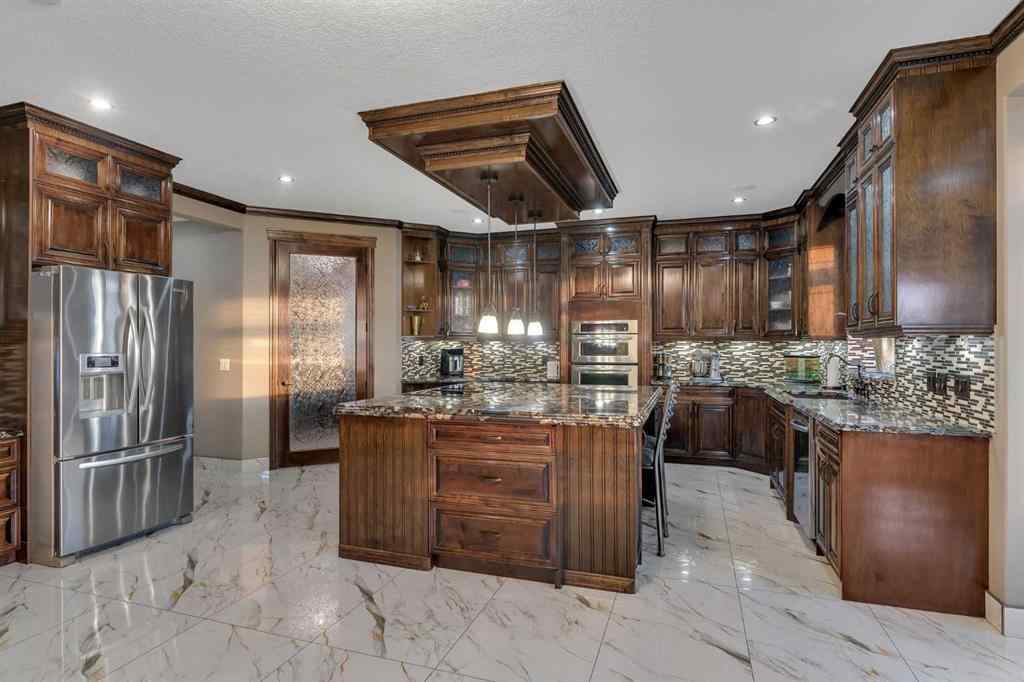 MLS® A2243988 - 989 East Lakeview Road  in East Chestermere Chestermere, Residential