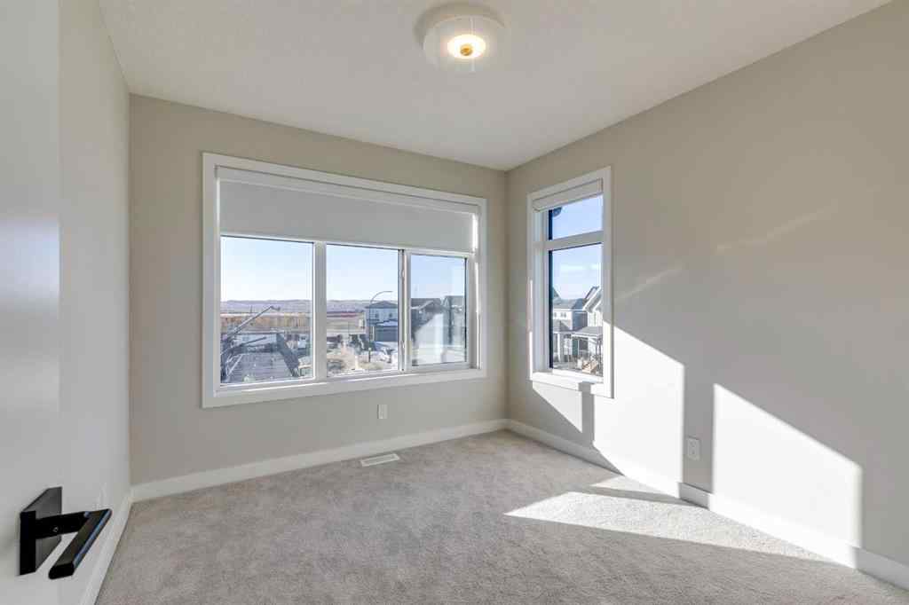 MLS® A2243991 - Unit #206 14800 1 Street NW in Livingston Calgary, Residential