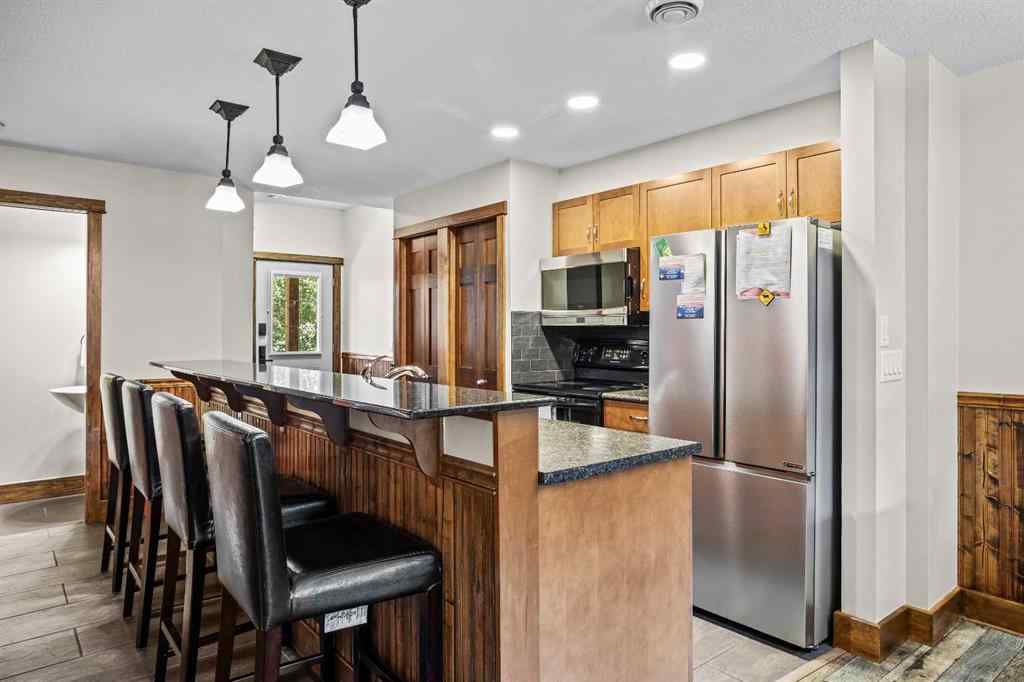 MLS® A2244015 - Unit #207 121 Kananaskis Way  in Bow Valley Trail Canmore, Residential