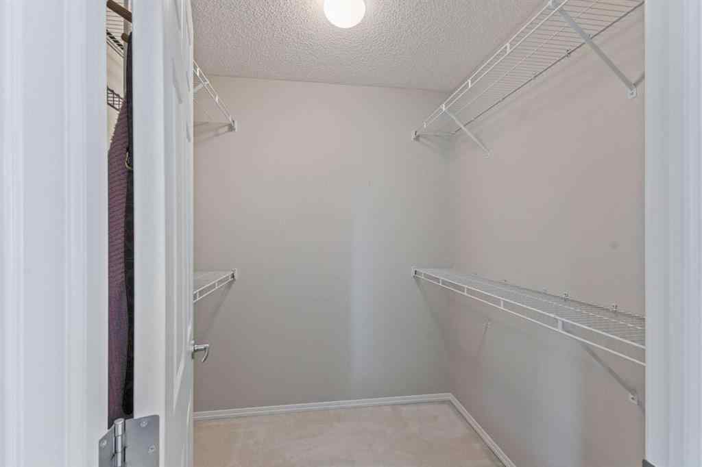 MLS® A2244053 - 11 Simcoe Crescent SW in Signal Hill Calgary, Residential