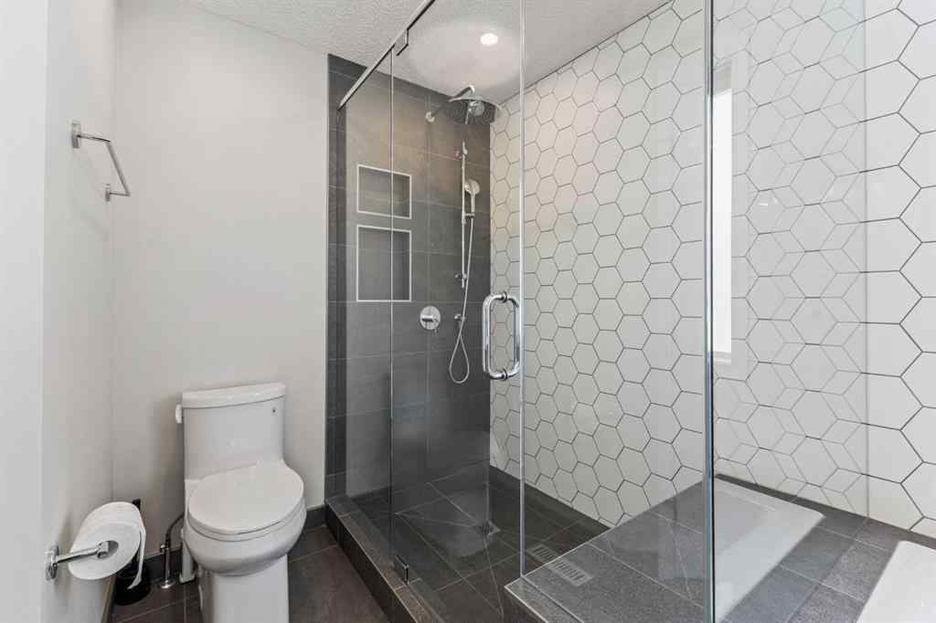 MLS® A2244053 - 11 Simcoe Crescent SW in Signal Hill Calgary, Residential