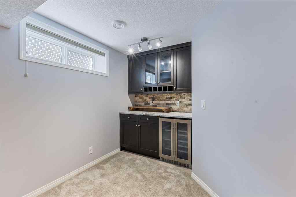 MLS® A2244053 - 11 Simcoe Crescent SW in Signal Hill Calgary, Residential