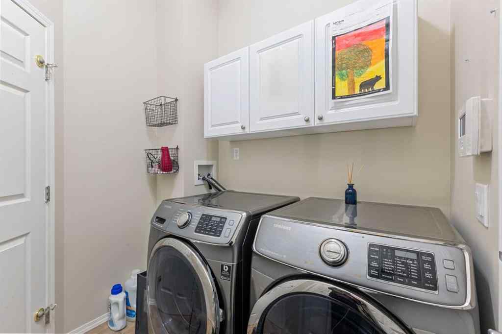 MLS® A2244053 - 11 Simcoe Crescent SW in Signal Hill Calgary, Residential