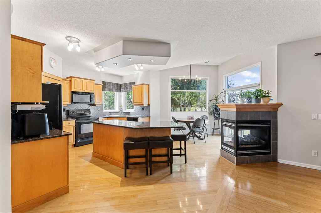 MLS® A2244053 - 11 Simcoe Crescent SW in Signal Hill Calgary, Residential