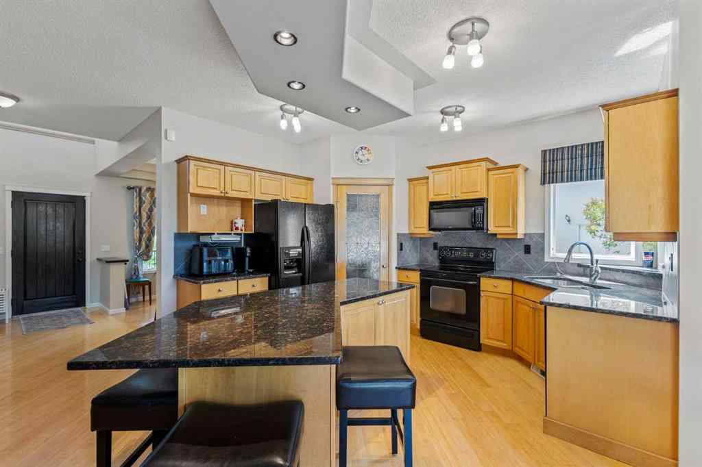 MLS® A2244053 - 11 Simcoe Crescent SW in Signal Hill Calgary, Residential