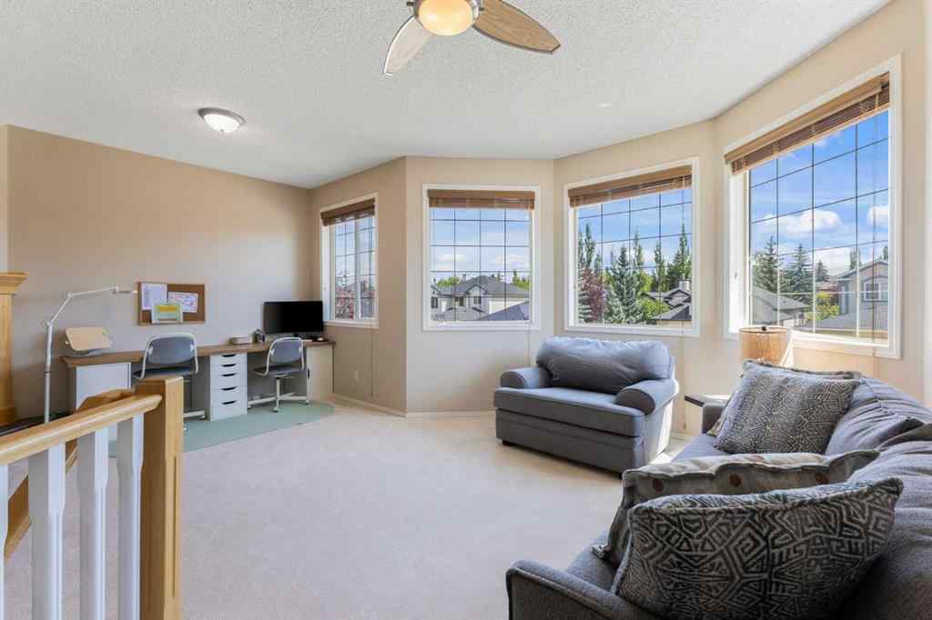 MLS® A2244053 - 11 Simcoe Crescent SW in Signal Hill Calgary, Residential