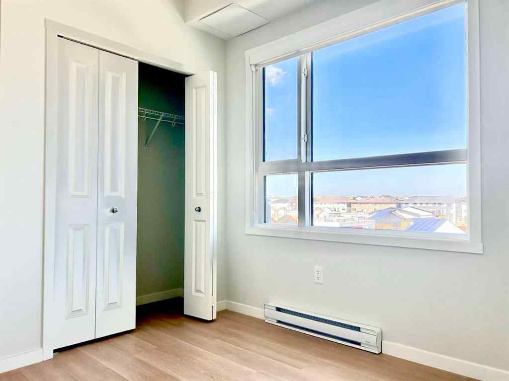 MLS® A2244057 - Unit #404 80 Carrington Plaza NW in Carrington Calgary, Residential