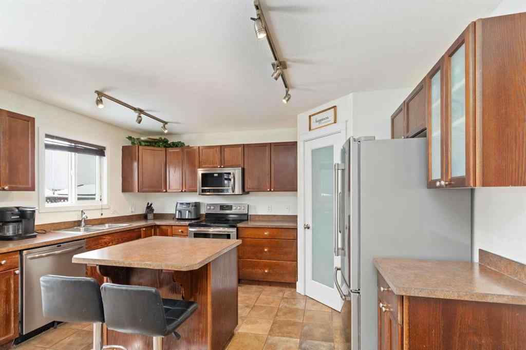 MLS® A2244082 - 128 Honeysuckle Way  in Timberlea Fort McMurray, Residential