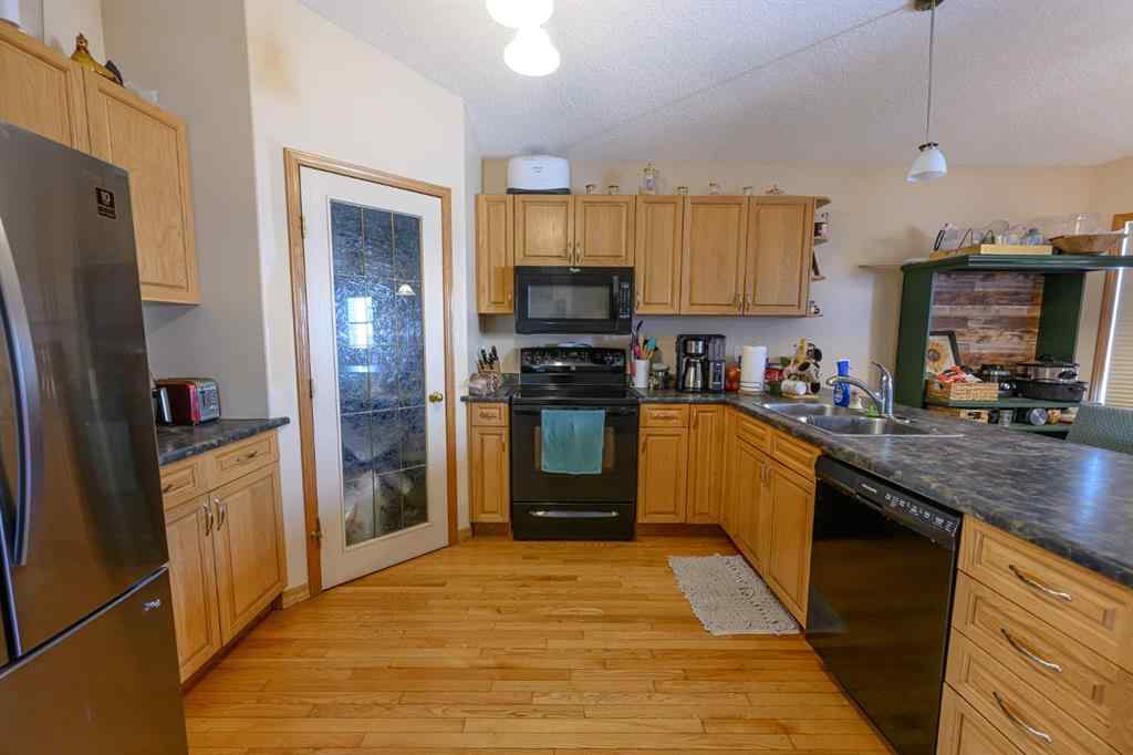 MLS® A2244089 - 12302 Crystal Lake Drive  in Crystal Lake Estates Grande Prairie, Residential